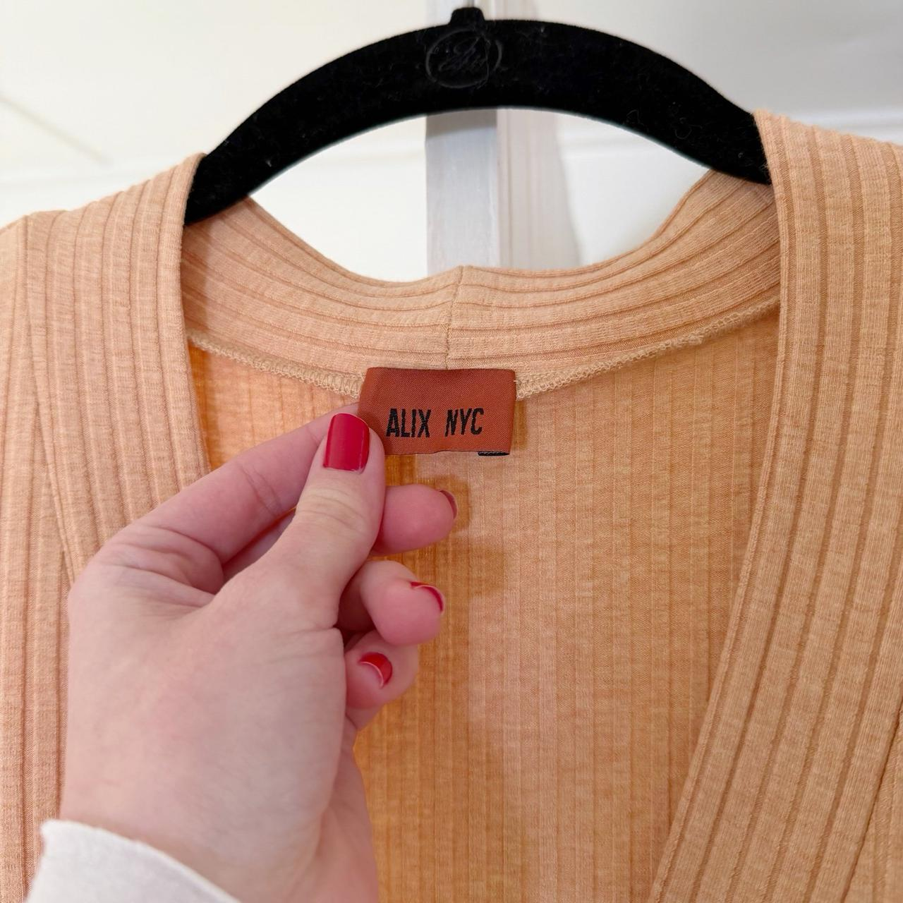 Alix NYC Inez Twist Front Split Hem Top in Peachy Size M